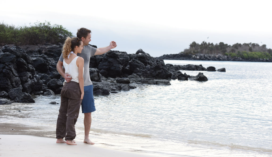 Santa Fe in Galapagos Island with Tourist on the beach