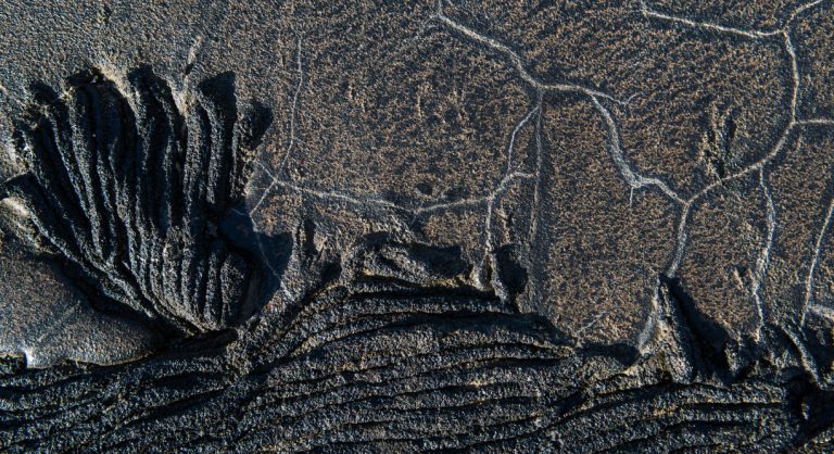 Sullivan bay in Santiago Island, solid lava