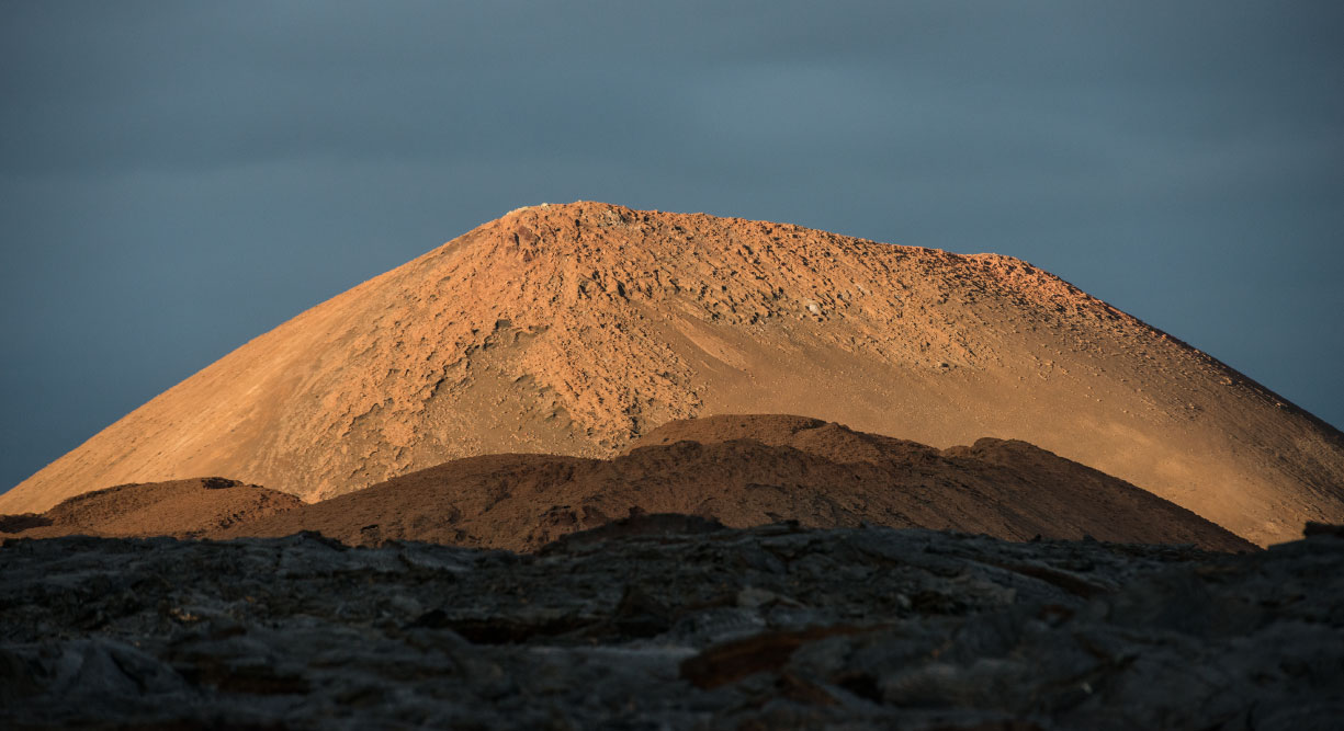 Sullivan bay in Santiago Island, view of the volcano