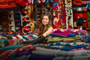 Otavalo Handcraft market and young woman